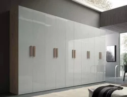 White hinged wardrobes in the hallway photo