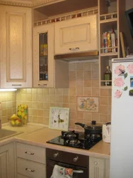 Kitchens with a cabinet above the stove photo