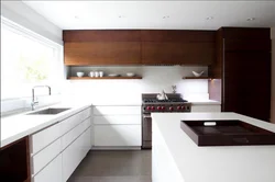 White kitchen with dark wood photo