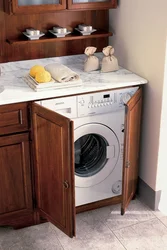 Washing Machine With Sink In The Kitchen Photo