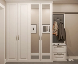 Built-in wardrobe in the hallway white photo