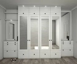 Built-in wardrobe in the hallway white photo