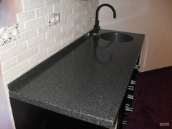 Photo of black artificial stone in the kitchen