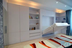 Bedroom built-in furniture with bed photo