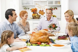 Family At The Table In The Kitchen Photo