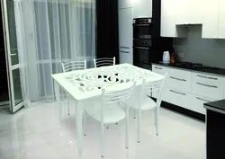 White glass table for the kitchen photo