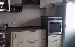 Photo of refrigerator and oven in the kitchen