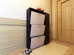 Wardrobe with shoe rack in a small hallway photo