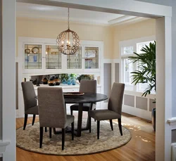 Chairs in the living room photo with a round table