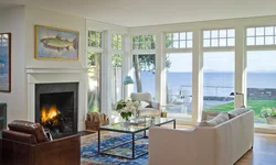 Living room with fireplace and panoramic windows photo