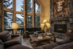 Living room with fireplace and panoramic windows photo