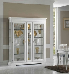 White display cabinets for dishes in the living room photo