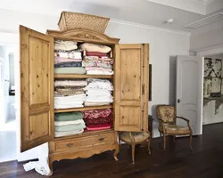 Wardrobe For Linen And Clothes In The Living Room Photo