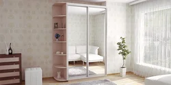 Wardrobe in the bedroom with a mirror photo dimensions