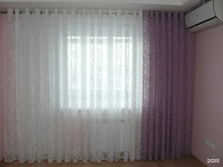 Tulle And Curtains In The Bedroom With Grommets Photo