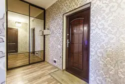 Light floor and dark wallpaper in the hallway photo
