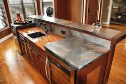 Wood-look stone countertop for kitchen photo