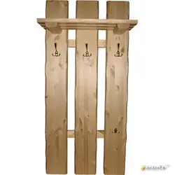 Coat rack with shelf in the hallway made of wood photo