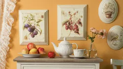 Wall with frames in the kitchen interior