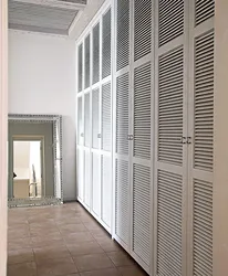 Louvered door to the dressing room in the interior