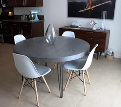 Gray table and chairs in the kitchen interior