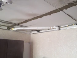 Hood under a suspended ceiling in the kitchen photo