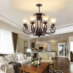 Two chandeliers in the living room photo