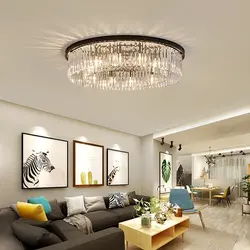 Two chandeliers in the living room photo