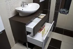 Cabinet with sink for a small bathroom photo