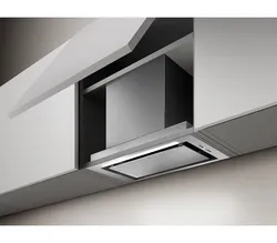 Built-in kitchen hood with ventilation outlet photo