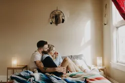 Photo of couple in bedroom