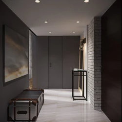 Photo of a hallway with a black floor