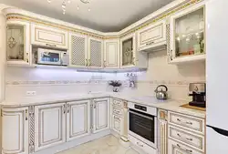 White kitchen with patina photo