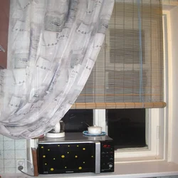 Microwave In The Kitchen On The Window Photo