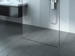 Shower with drain in bathroom photo