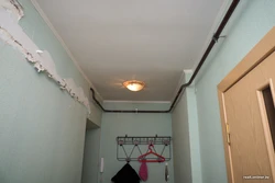 Gas pipe under the ceiling in the kitchen photo