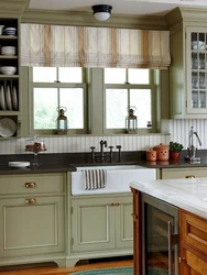 Kitchen in a wooden house with a sink by the window photo