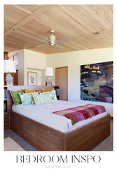 Bedroom Design In A House With A Wooden Ceiling