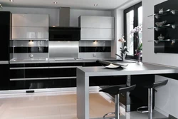 White and black kitchens with bar counters photo