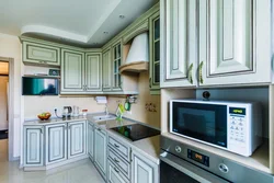 Kitchen Design With Refrigerator And TV
