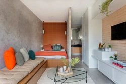 Studio design with bed and sofa and kitchen