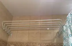 Настенные сушилки для белья в интерьере ванной