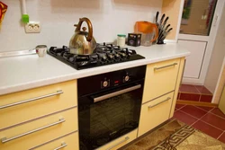 Cooktop and cabinet photo in the kitchen