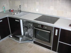 Corner kitchen design photo with dishwasher