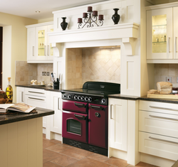 Gas stove in the interior of a small kitchen photo