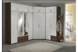 Hallway with swing doors and mirror photo