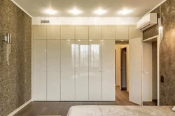Built-in wardrobes in the bedroom up to the ceiling design