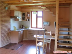 Interior of a small kitchen in an economy class house photo
