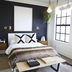 Bedroom interior with dark wall near the bed
