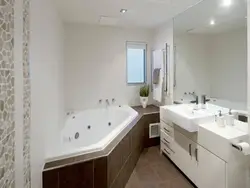 Bathroom design corner bath with window